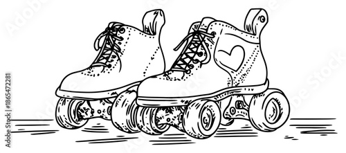 Pair of retro style roller skates with laces and heart detail