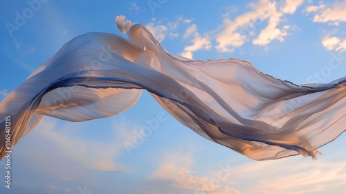 A precious blanket becoming one with the sky defying gravity for a brief moment.