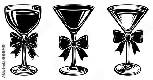 Vintage style wine glasses decorated with ribbon bows in engraving technique