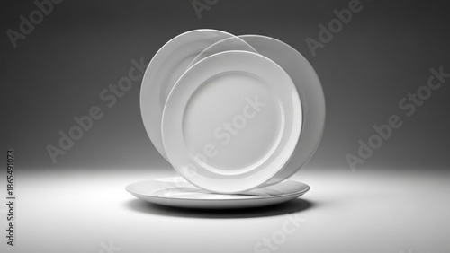 Stack of white ceramic dinner plates