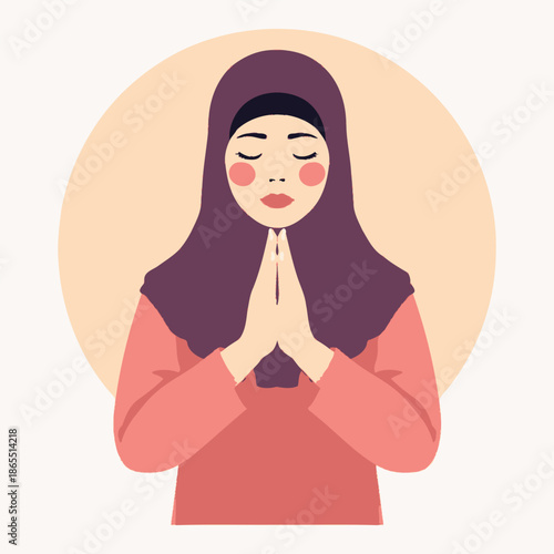 A serene Muslim woman in a hijab praying with clasped hands and closed eyes.