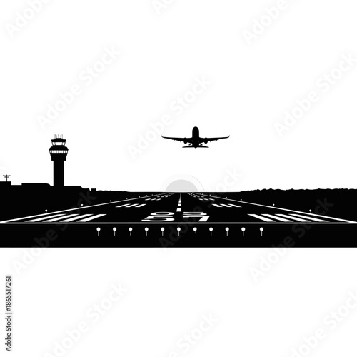 A silhouetted airplane approaches a runway with an airport control tower