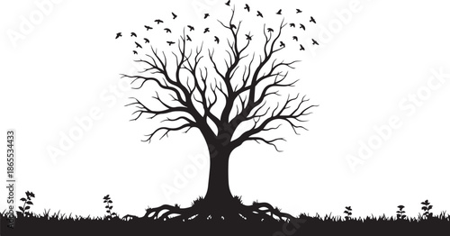 A tree with birds flying in the sky 