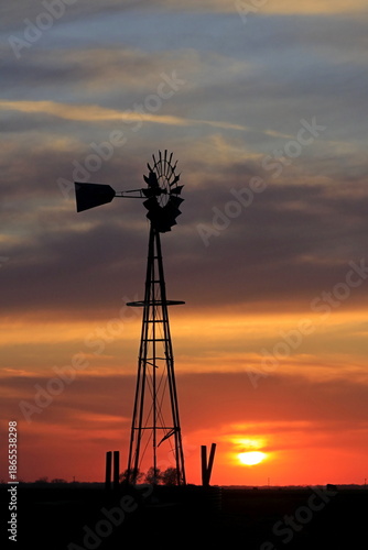 windmill at sunset with clouds