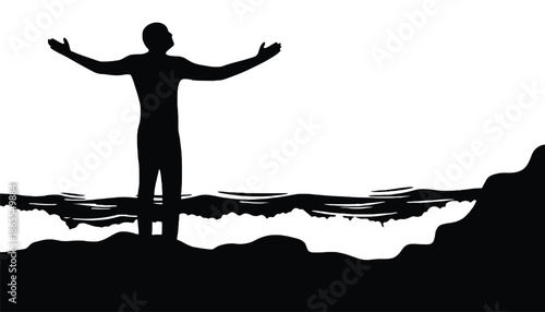 A man stands in silhouette with arms outstretched on a cliff overlooking water