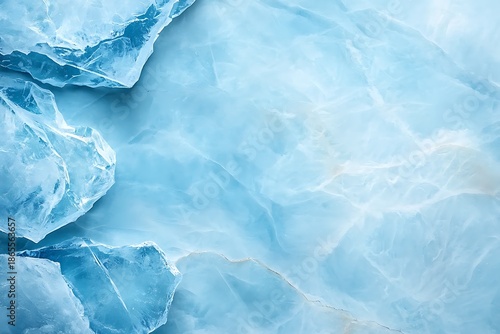 Blue Ice Fragments on a Light Blue Surface Featuring Textured Natural Patterns and Colors