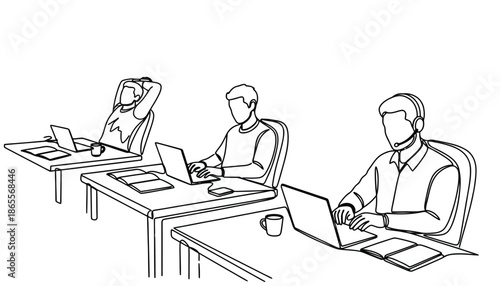 Men working on laptops in modern office setting