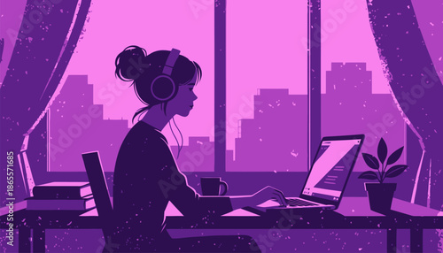 Young woman wearing headphones working on laptop at modern desk