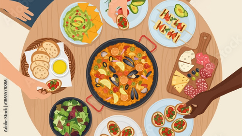 People sharing delicious food and tapas at a round table.