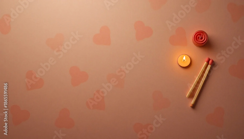 Soft pink valentine's day flat lay with matches and candle on heart patterned background with love