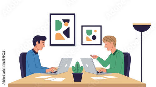 Two Men Working on Laptops Together.