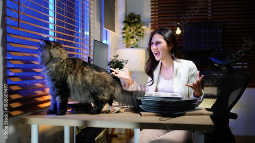 Canvas Print businesswoman work in home office and pets interruption while working at home