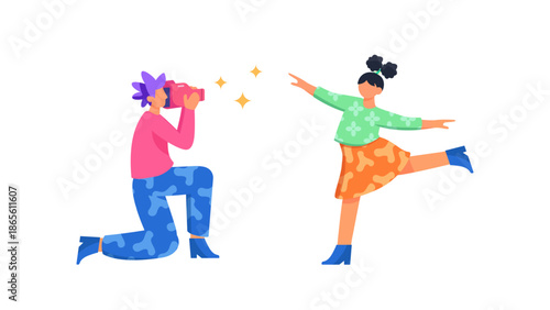 A professional photographer kneeling while taking a picture of a young girl posing and dancing with joy against a white background