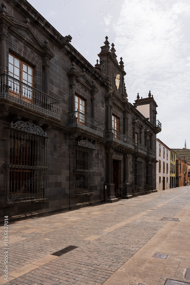 Fototapeta premium Casa Salazar facade, episcopal palace and diocesan offices, historic stone architecture in La Laguna, San Cristobal de La Laguna, Tenerife.