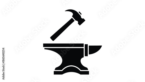 Blacksmith s tools a hammer resting on an anvil a classic workshop scene