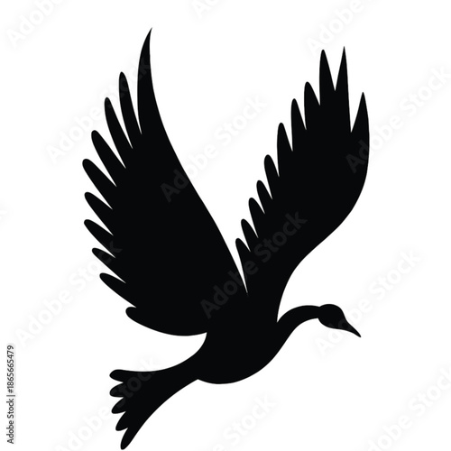 a vector silhouette of a bird in mid flight