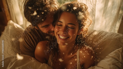 Joyful couple sharing a tender moment with soft light and snowflakes