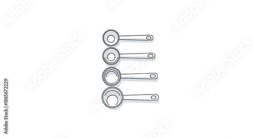 Row of four silver metal measuring cups of different sizes arranged vertically against a plain white background for cooking.