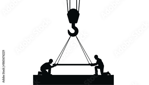 Two workers using a crane to lift a heavy object in a construction site