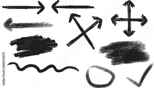 A collection of hand drawn black brushstroke arrows lines shapes and scribbles on a plain white background