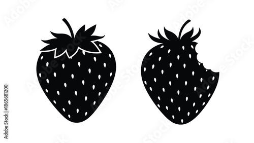 two black strawberries with white seeds on a plain white background