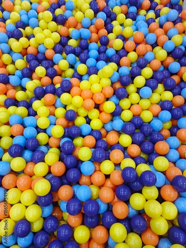 Vibrant Plastic Balls Filling a Playground Ball Pit Area with Colorful Orbs from an Overhead Viewpoint