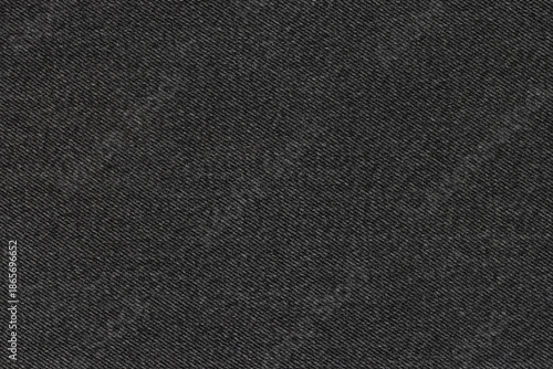 Dark-colored denim, for jackets, jeans and other clothing, close-up. Background, texture.