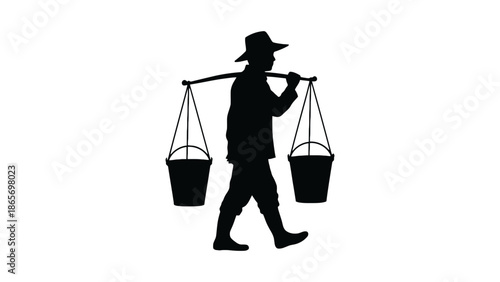 Silhouette of a person carrying buckets of water on a pole