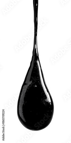 Heavy oil drop in motion isolated on white, representing pollution, industry, or environmental impact