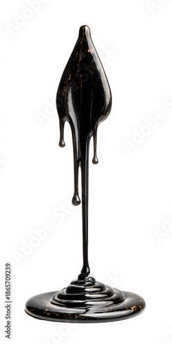 Heavy oil drop in motion isolated on white, representing pollution, industry, or environmental impact