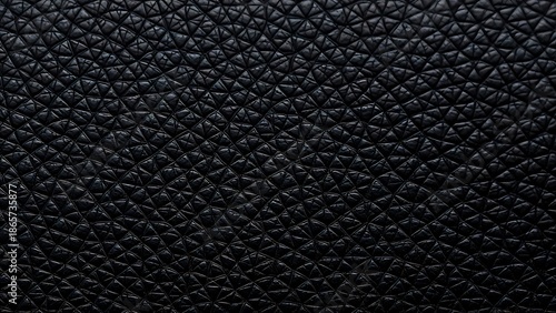 Wallpaper Mural Close-up of black leather with fine grain texture, emphasizing its smooth and luxurious quality. Torontodigital.ca