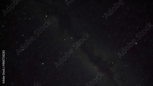 Elegant, luminous chains of star clusters weaving through the velvet blackness of space like a celestial necklace.