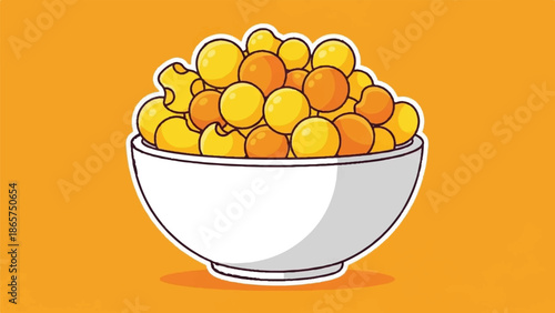 A white bowl filled with cheerful yellow and orange macaroni pasta on a vibrant orange background
