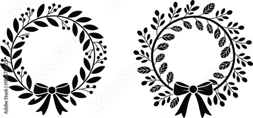 Two elegant laurel wreath silhouettes with decorative ribbons and berries for wedding invitations or award certificates