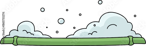 A light blue foamy substance with scattered bubbles rests on a green horizontal band