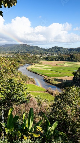 Serene River Flowing Through Lush Green Fields and Forested Hills
