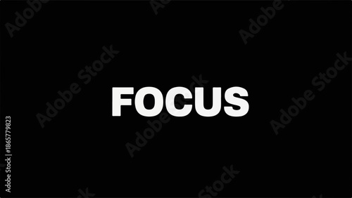 Bold white text "FOCUS" stands out against a stark black background, representing concentration and clarity.