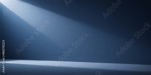 An empty dark room featuring a blue spotlight on a brushed metallic steel wall with a silver aluminum plate texture and gray stainless surface pattern for a modern industrial backdrop design