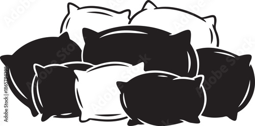 Pile of Black and White Pillows in a Heap