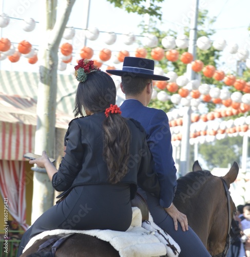 A couple in the world famous Feria de abril from Seville, Andalusia, Spain 
