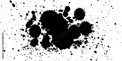 Drops of black ink on a white background.