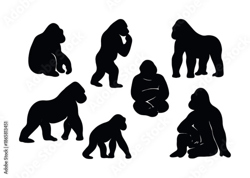 Silhouettes of gorillas in various poses on white background