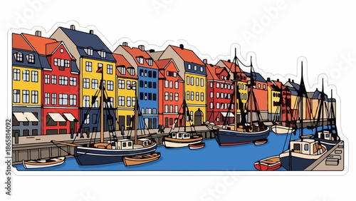 Colorful buildings line a canal with boats docked along the waterfront