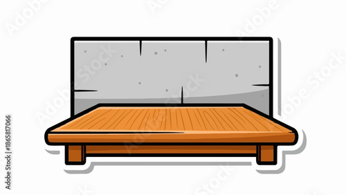 A wooden platform rests before a stone wall, ready for display