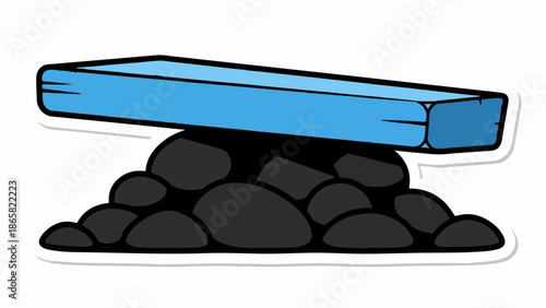 A simple blue plank rests precariously on a pile of rough, dark stones