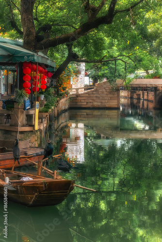 Suzhou Canal Town with Red Lanterns, Wooden Boats and Stone Bridges