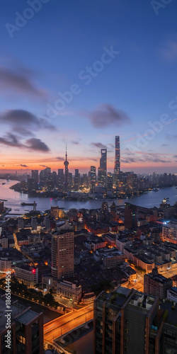 Canvas Print Shanghai Skyline Sunset from Above with Illuminated Skyscrapers and Huangpu Rive