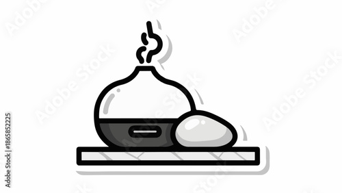 Aromatherapy diffuser with a smooth stone and steam rising