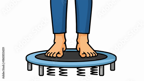 Bare feet and legs in blue jeans stand on a trampoline
