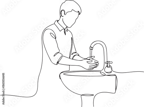 Personal hygiene concept, a person washing hands under running water at a sink with soap dispenser